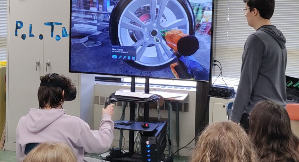 Project Lead the Way (PLTW) Student using Virtual Reality to Learn about Automotive Repair
